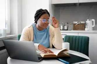 medium shot woman with laptop home scaled e1757680931652 lwsoptimized